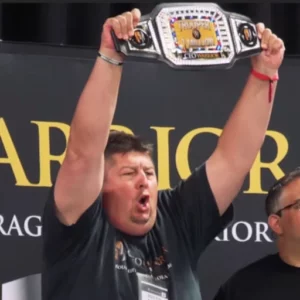 Dustin Folkes celebrating belt award